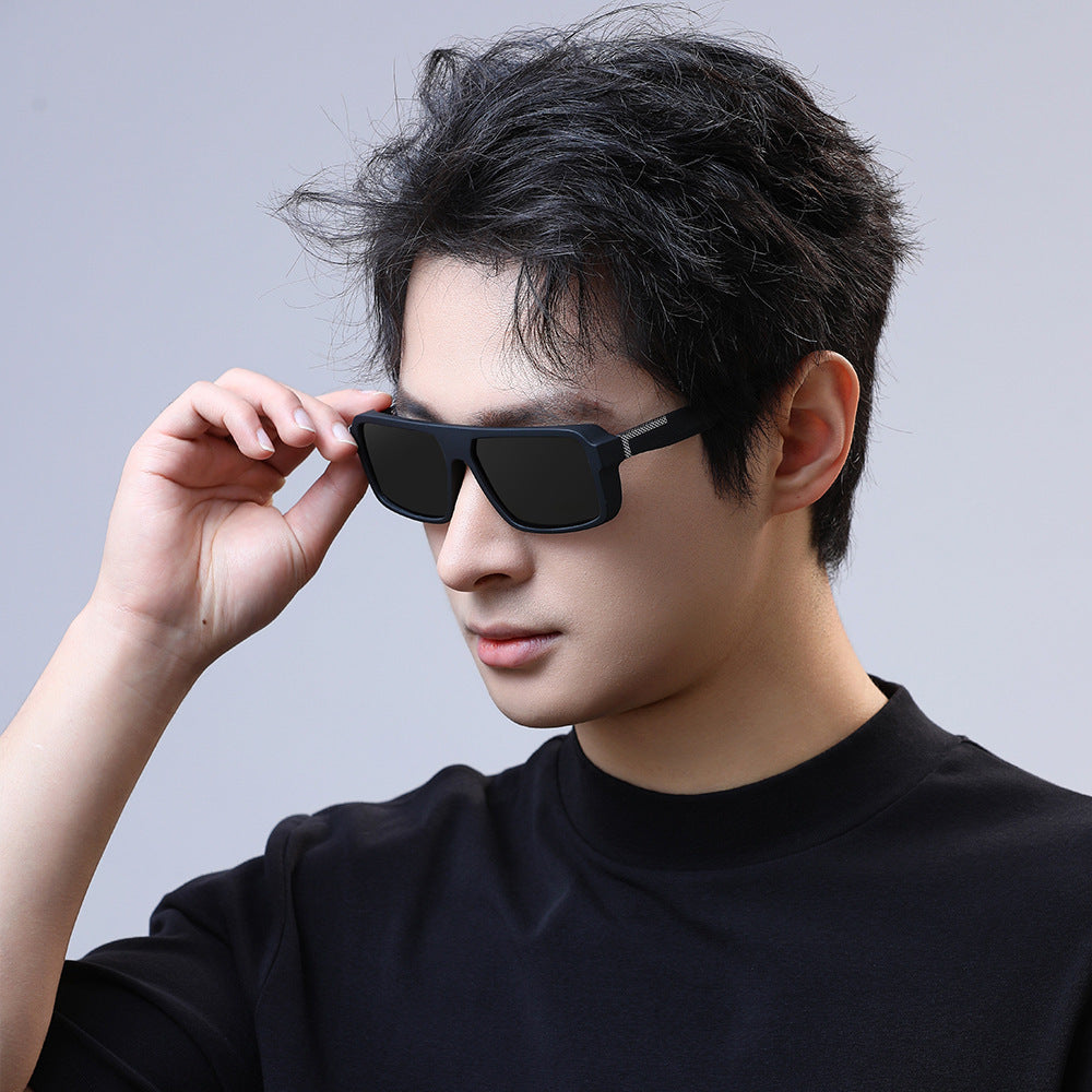 Polarized Sunglasses Sunglasses Men's Sunglasses UV Protection worn by a stylish man with a black t-shirt and black sunglasses.